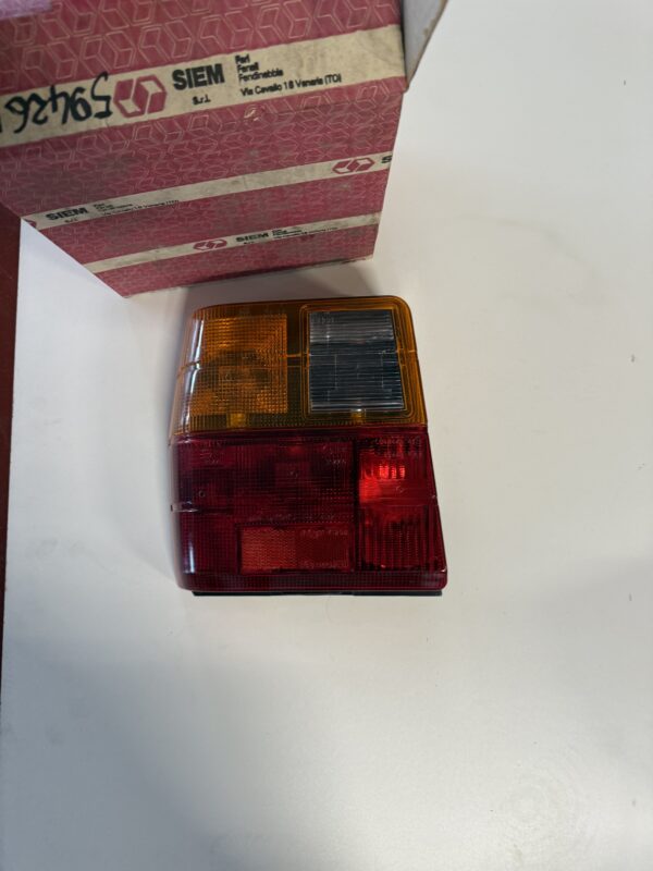 Fanale post. completo Sx Fiat Uno 1serie (Originale FIAT). Nuovo